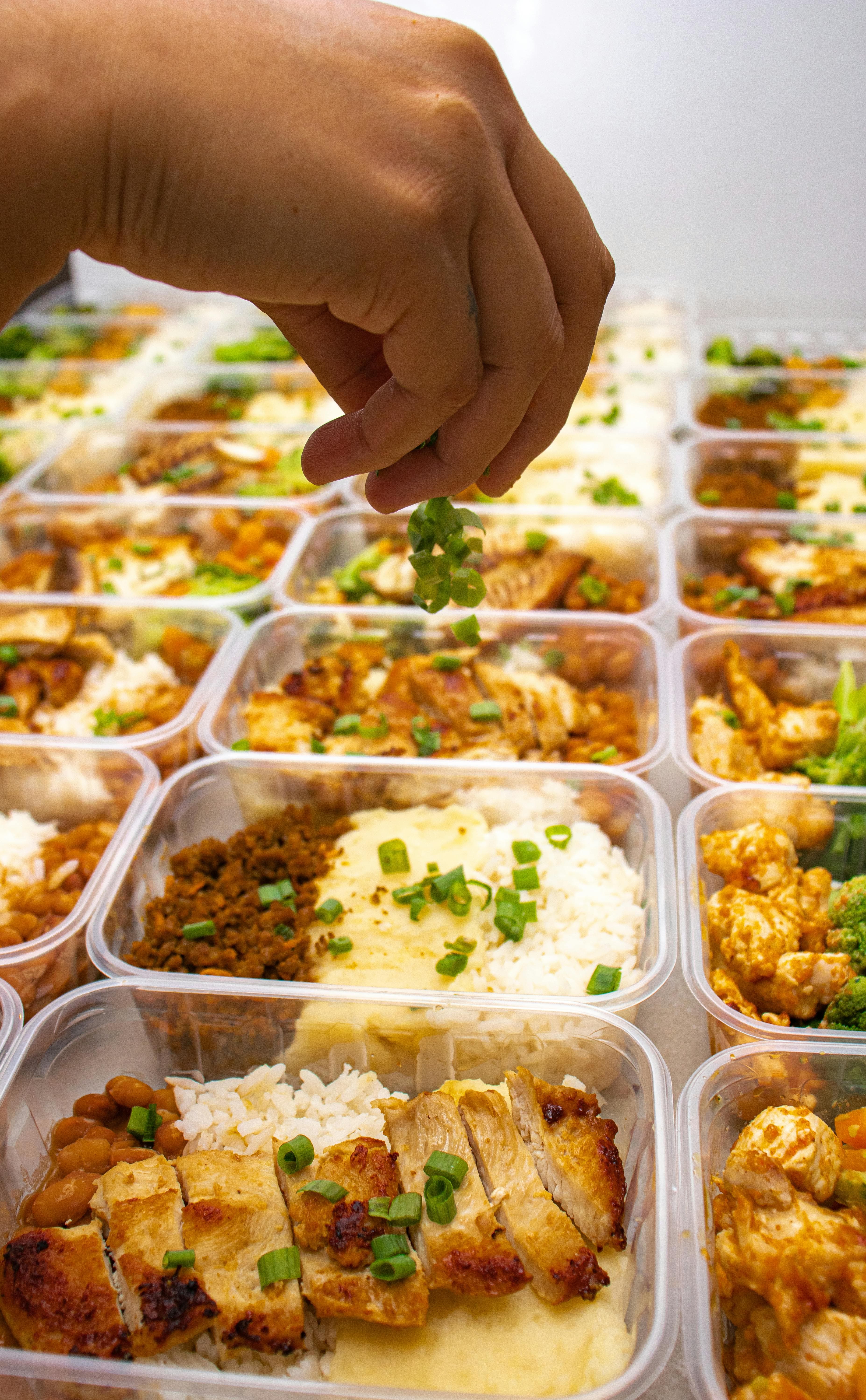 Batch meal prep containers prepared for performance-focused gym nutrition