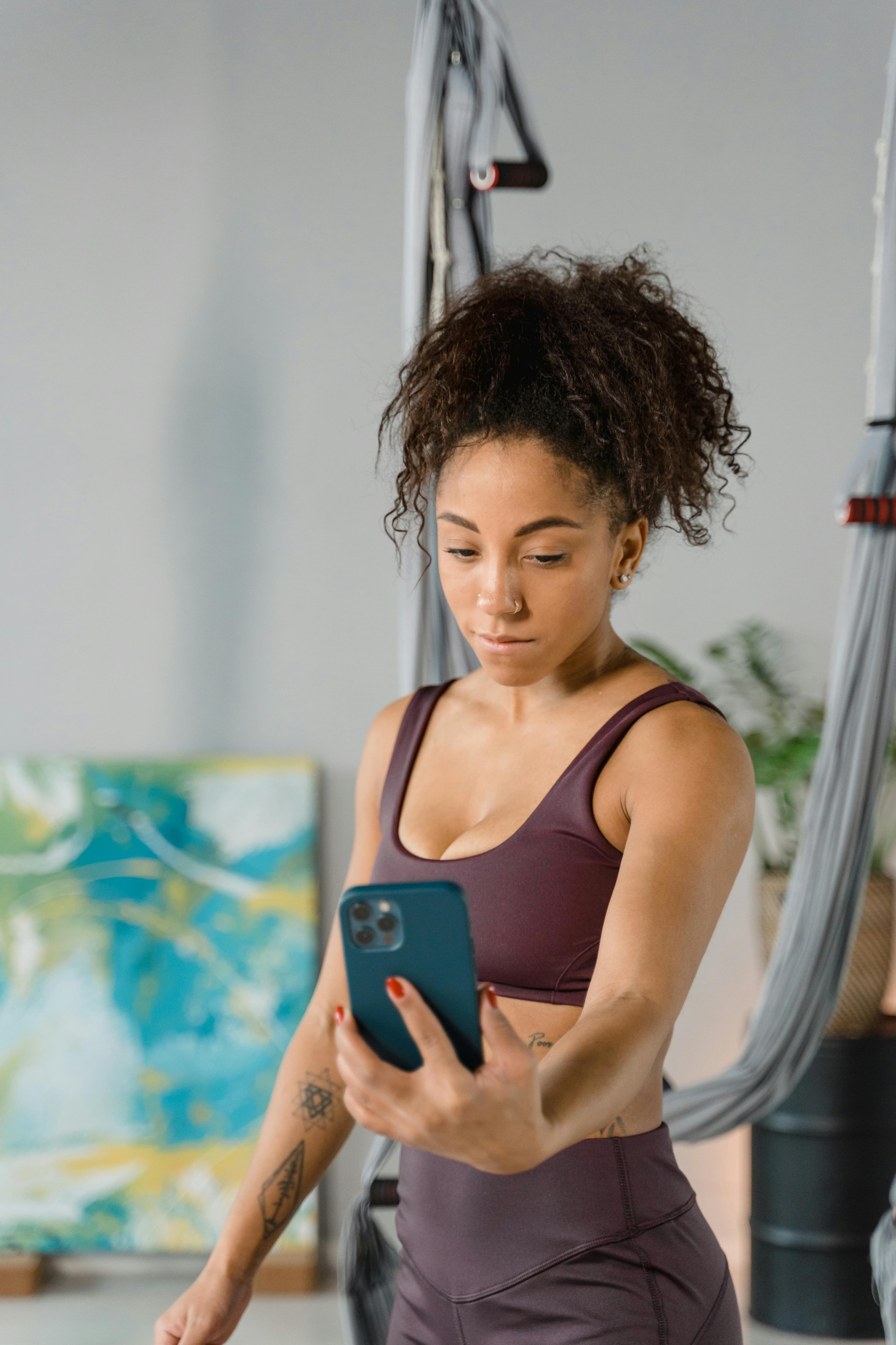 Athlete using a mobile device during training for coaching feedback