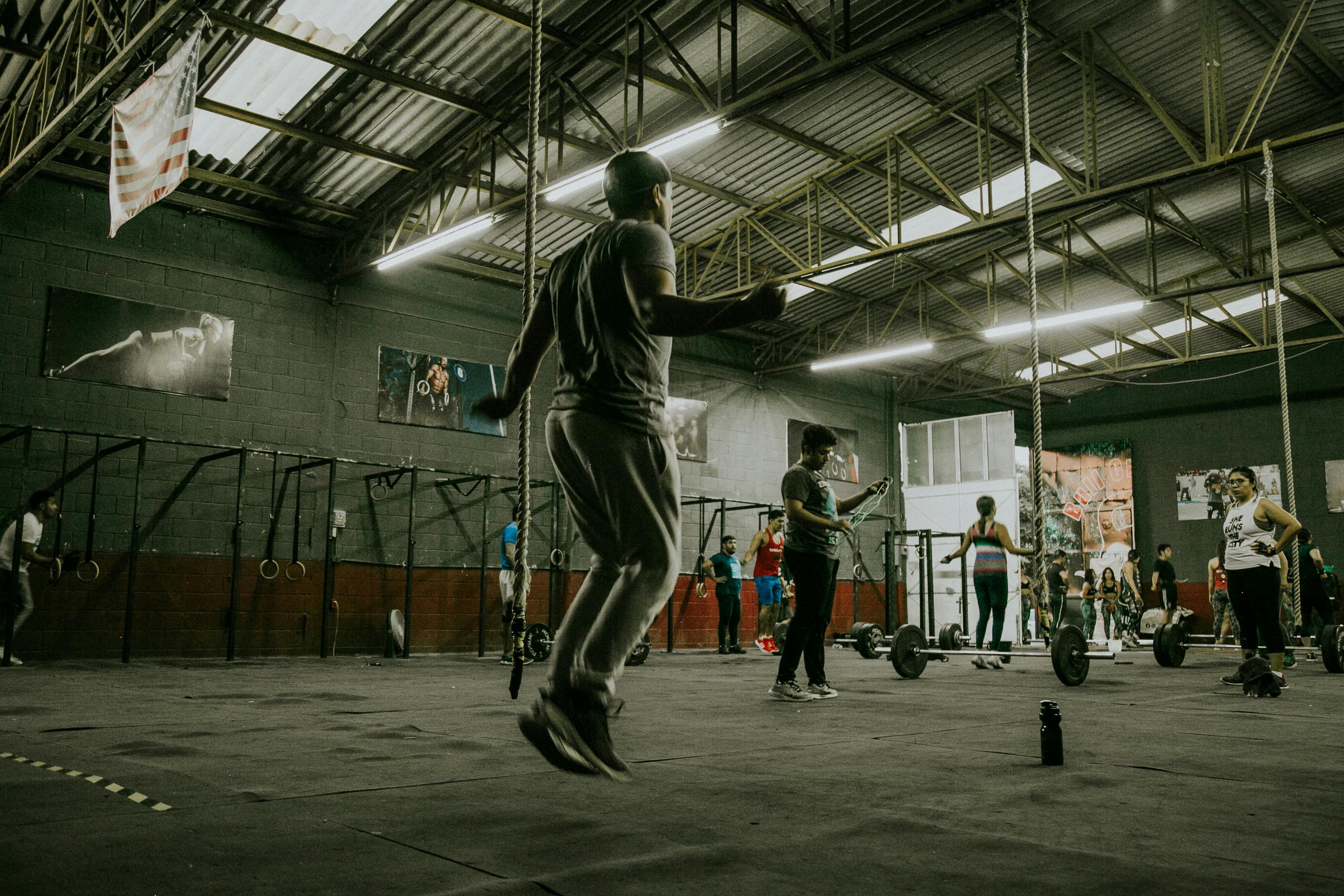 Group strength session in a modern gym environment