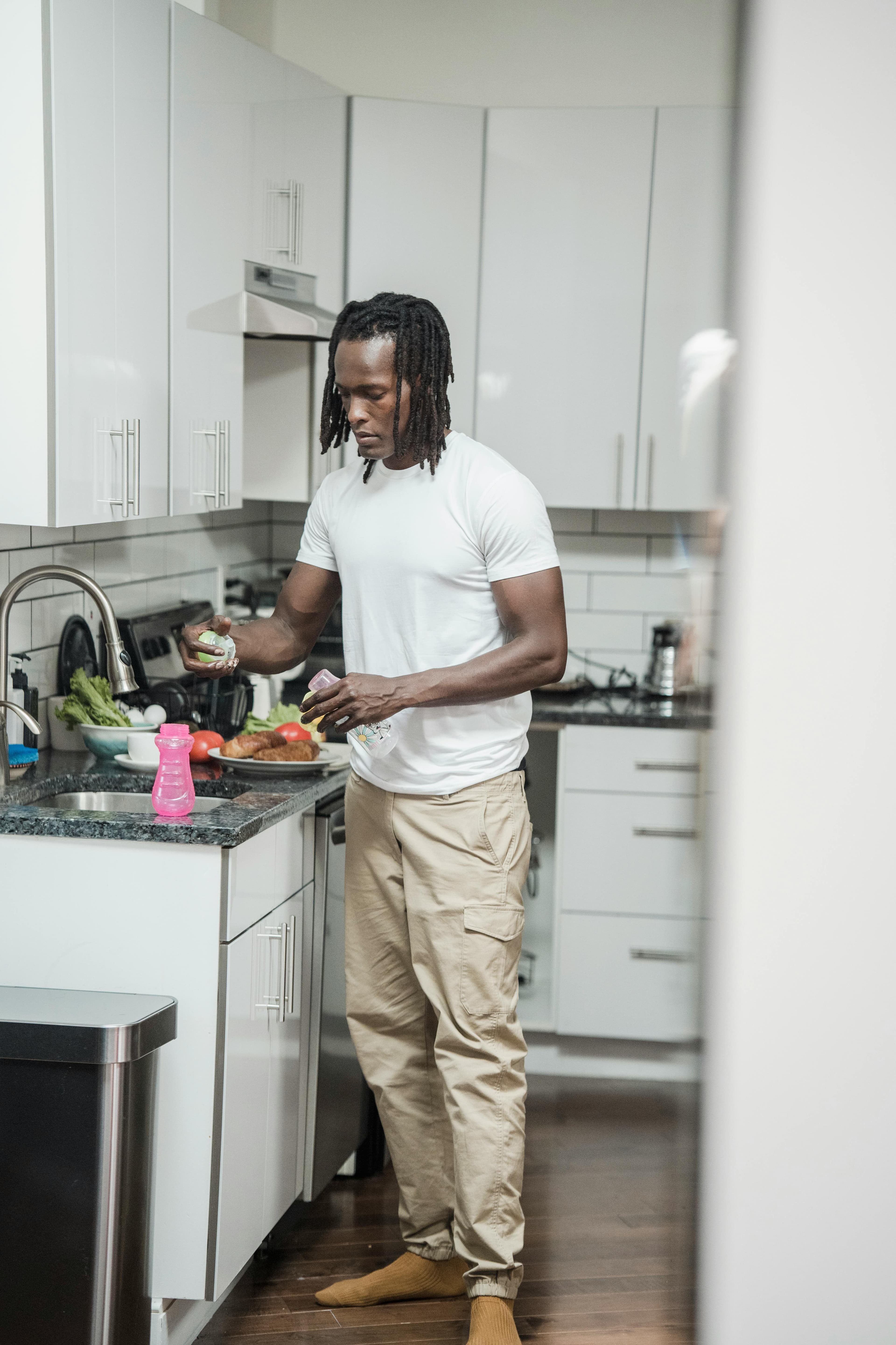 Athlete preparing a nutrient-focused meal in the kitchen
