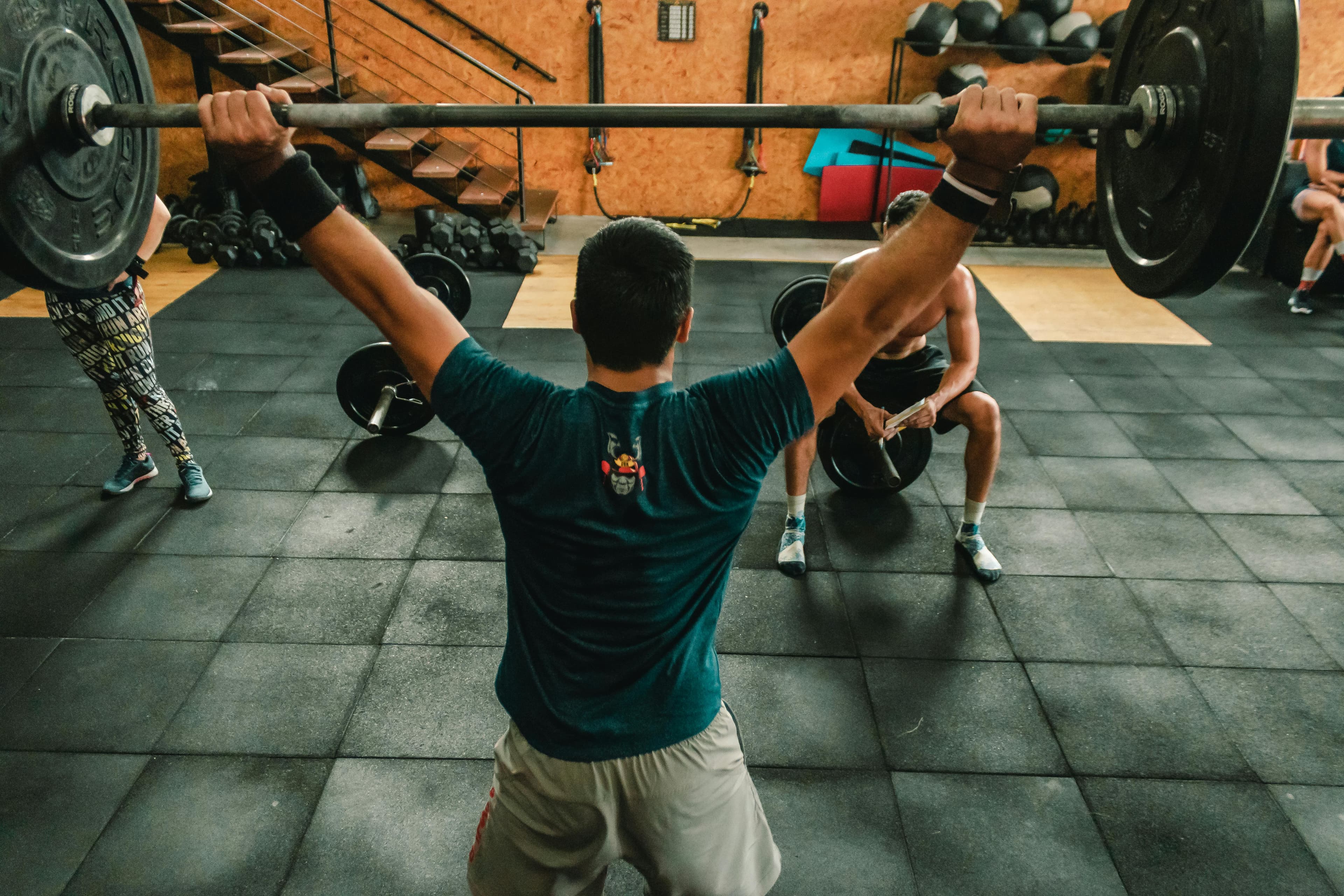 Athletes training together during a group strength session